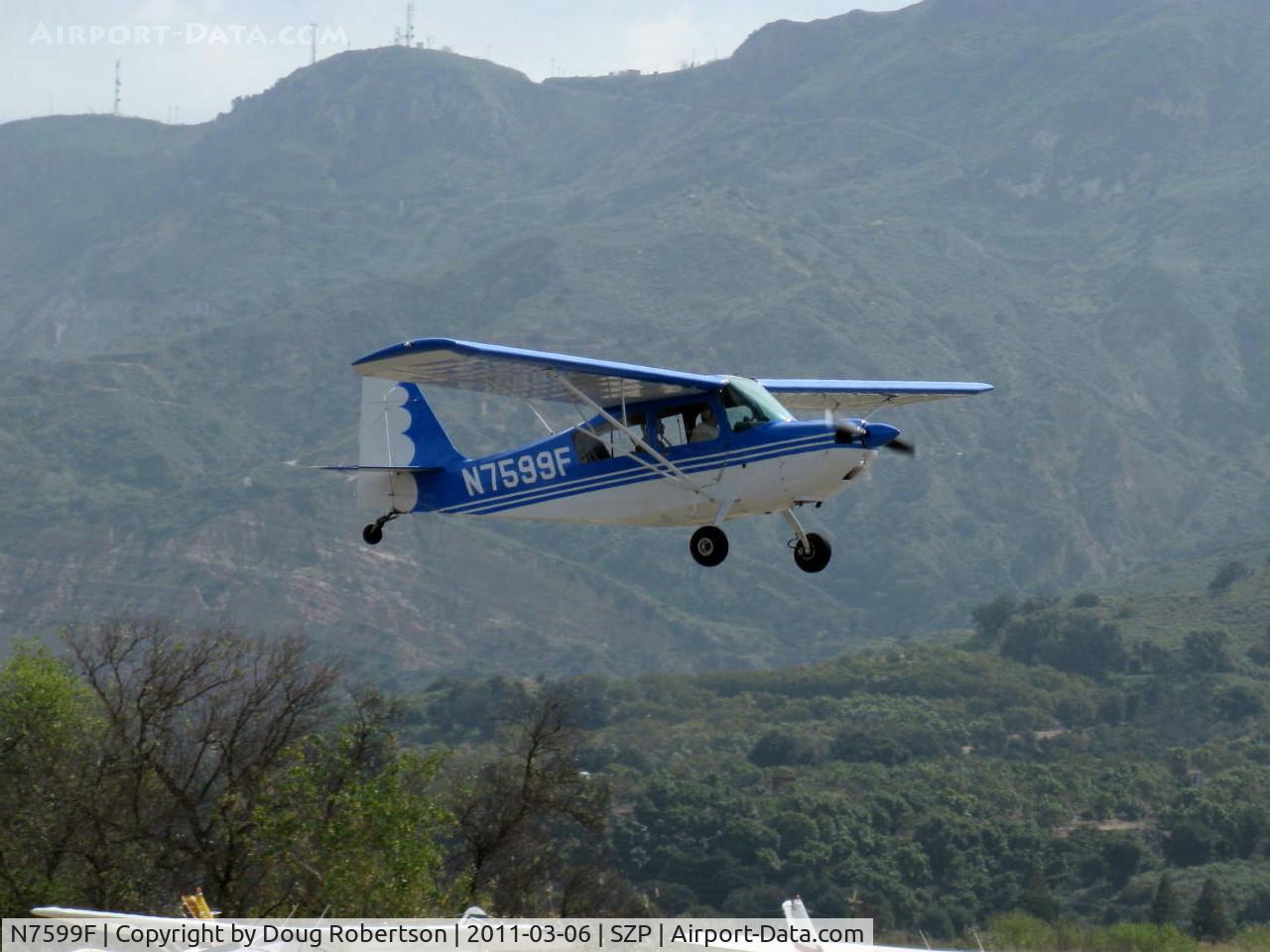 N7599F, 1970 Champion 7ECA Citabria C/N 745-70, 1970 Champion 7ECA CITABRIA, Lycoming O-235 115 Hp, Young Eagles Flight, on short final landing Rwy 22L grass