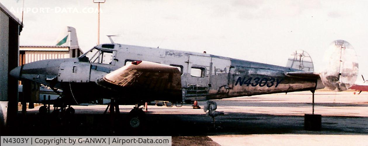N4303Y, Beech E18S C/N BA171, Tri gear Beech at Fort Lauderdale in the 1980's