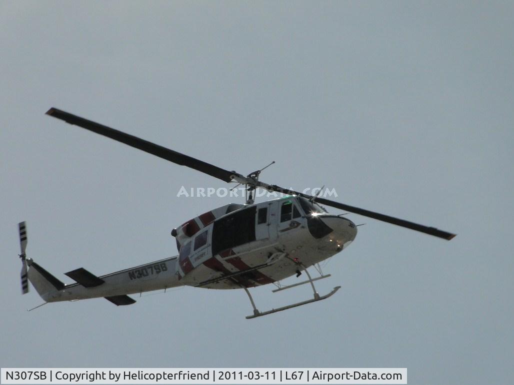 N307SB, 1975 Bell 212 C/N 30781, Flying in the pattern returning to SBSO helipad area for training