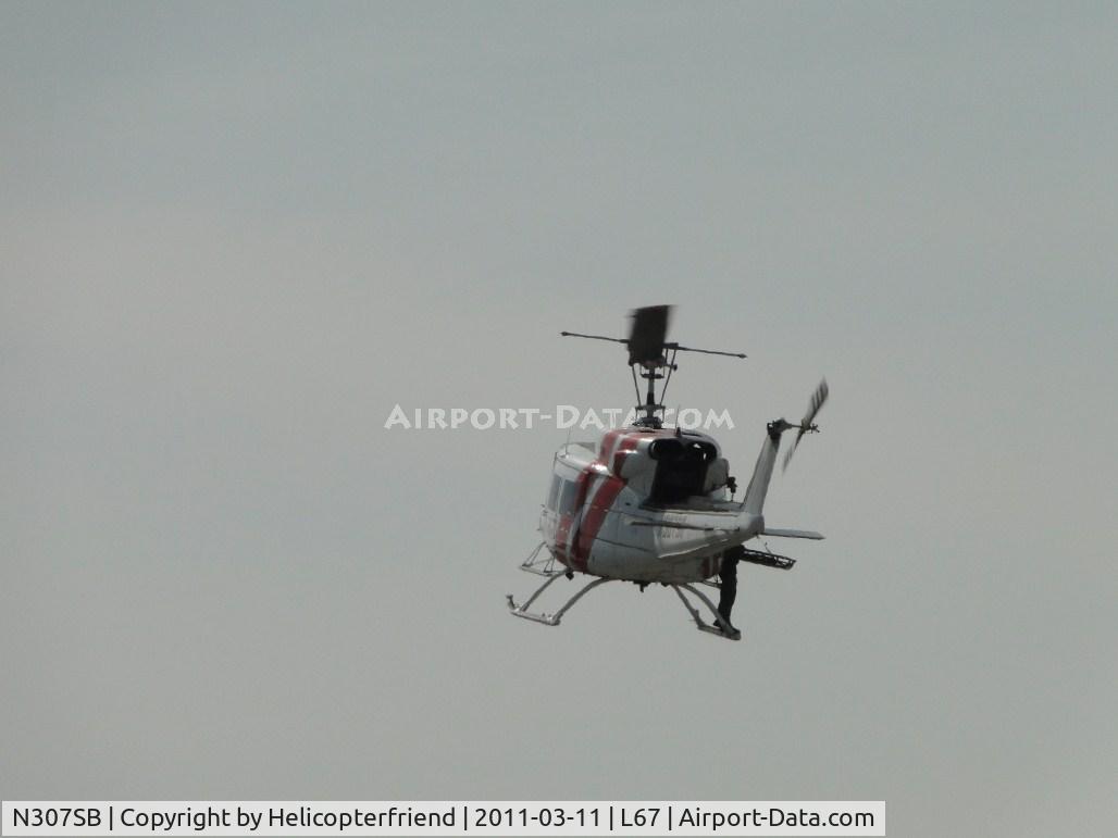 N307SB, 1975 Bell 212 C/N 30781, Flaring to a stop & hover position for training