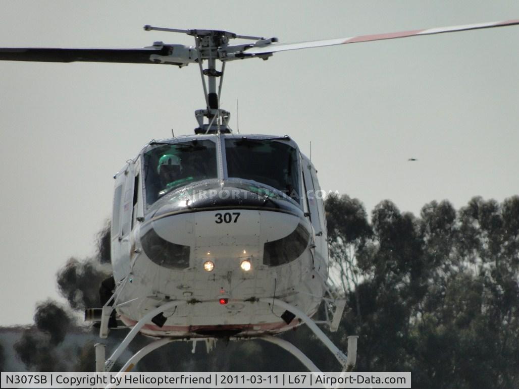 N307SB, 1975 Bell 212 C/N 30781, Training completed and heading back to the helipad helicopter mover