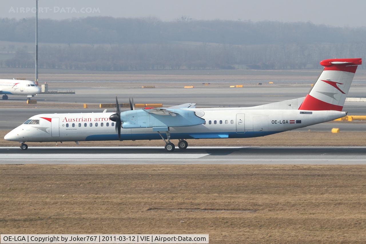 OE-LGA, 1999 De Havilland Canada DHC-8-402Q Dash 8 C/N 4014, Austrian arrows
