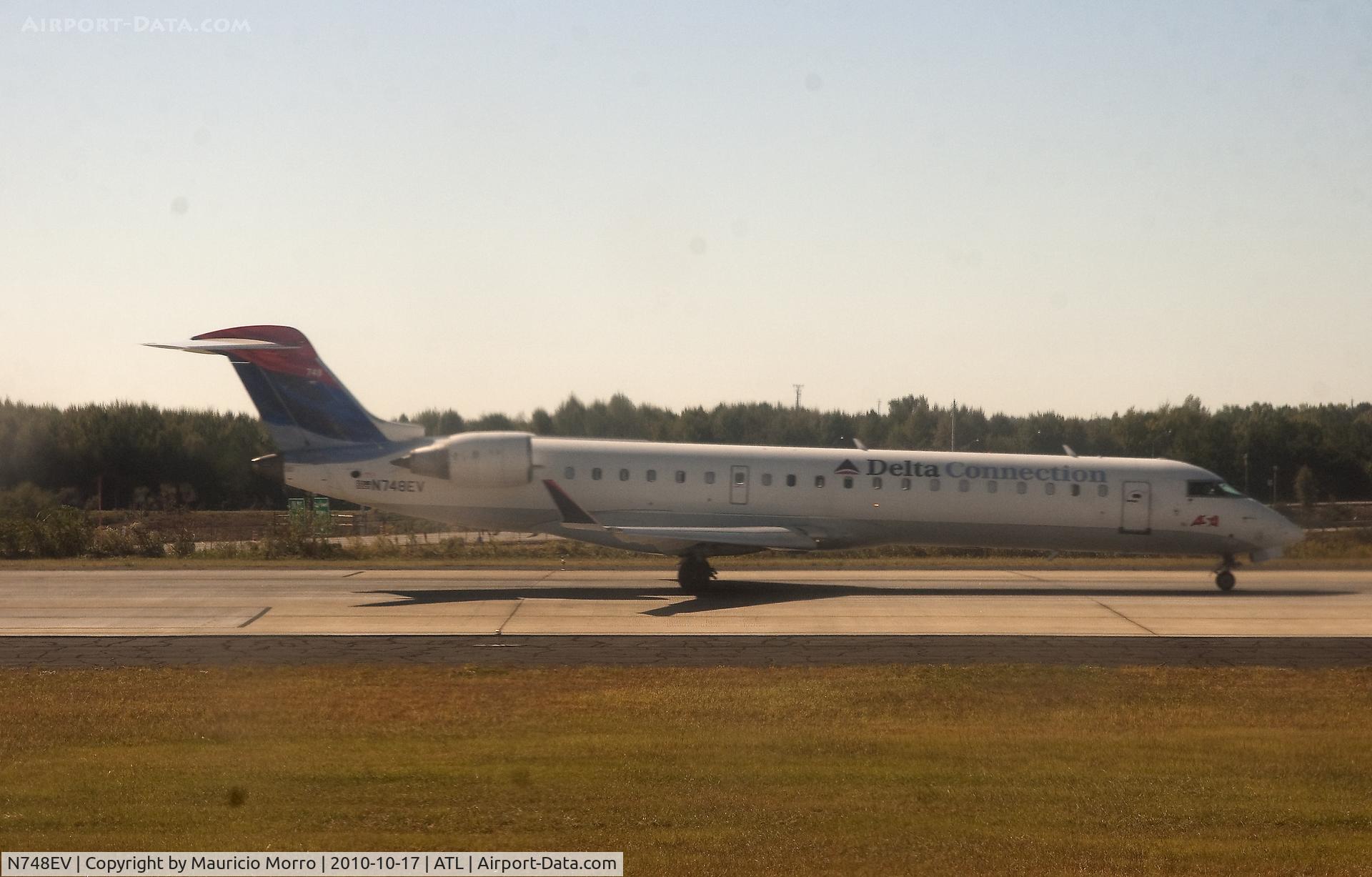 N748EV, 2004 Canadair CRJ-700 (CL-600-2C10) Regional Jet C/N 10158, Bombardier CL-600 from Delta Connection about to take off at Hartsfield/Atlanta