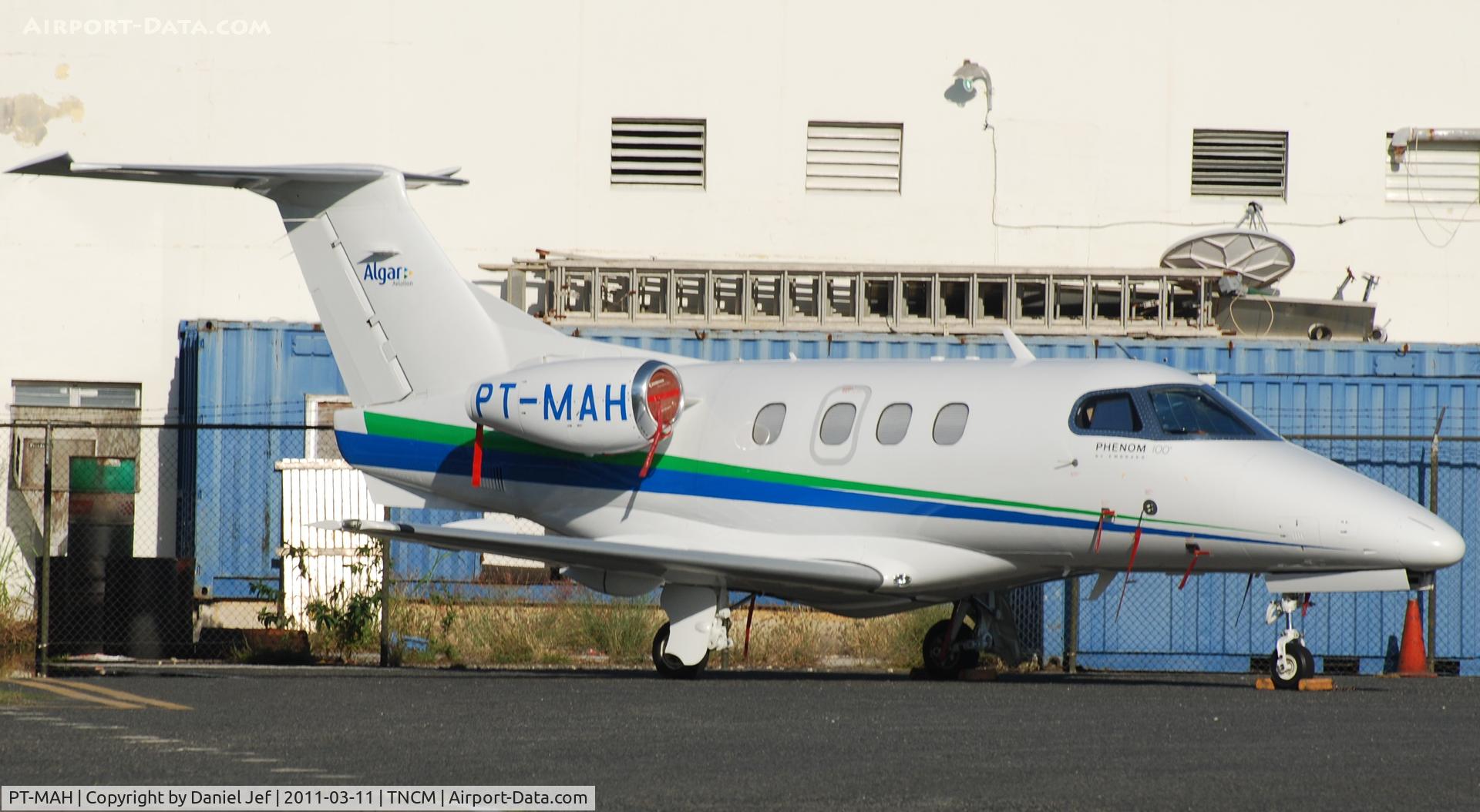 PT-MAH, 2009 Embraer EMB-500 Phenom 100 C/N 50000026, PT-MAH park one the east ramp at TNCM