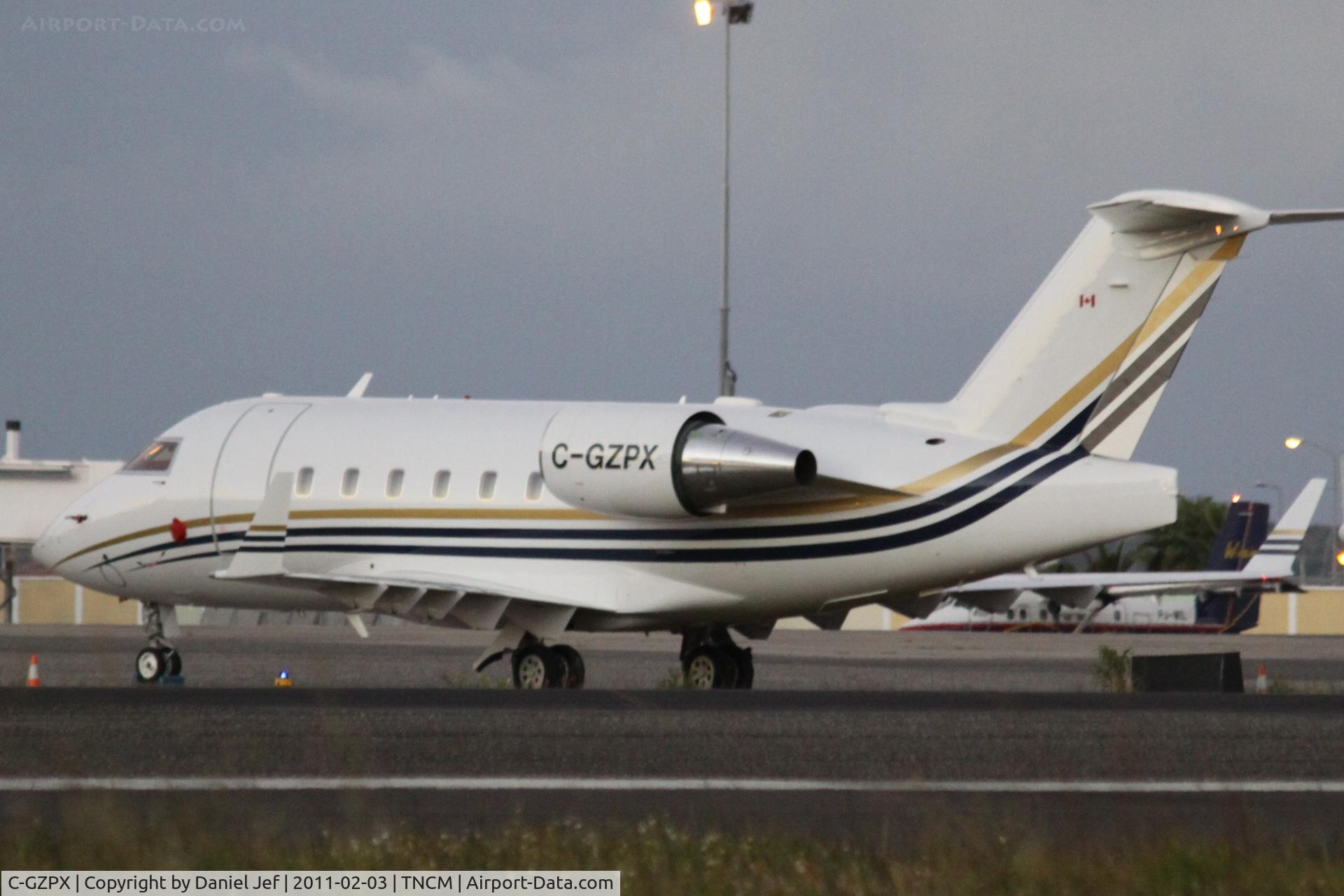 C-GZPX, 1999 Bombardier Challenger 604 (CL-600-2B16) C/N 5458, C-GZPX park on the main ramp at TNCM