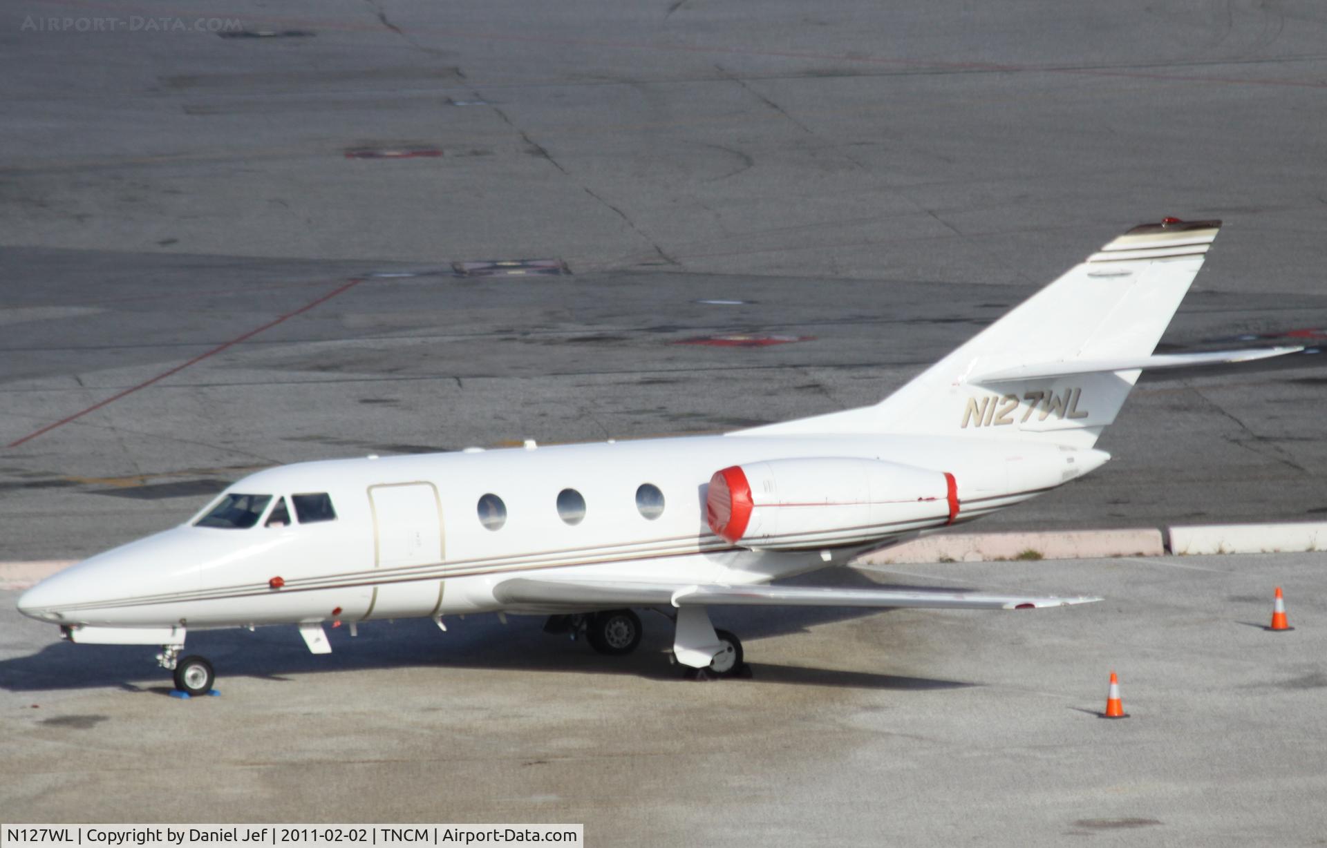 N127WL, 1974 Dassault Falcon 10 C/N 16, N127WL park on the main ramp at TNCM