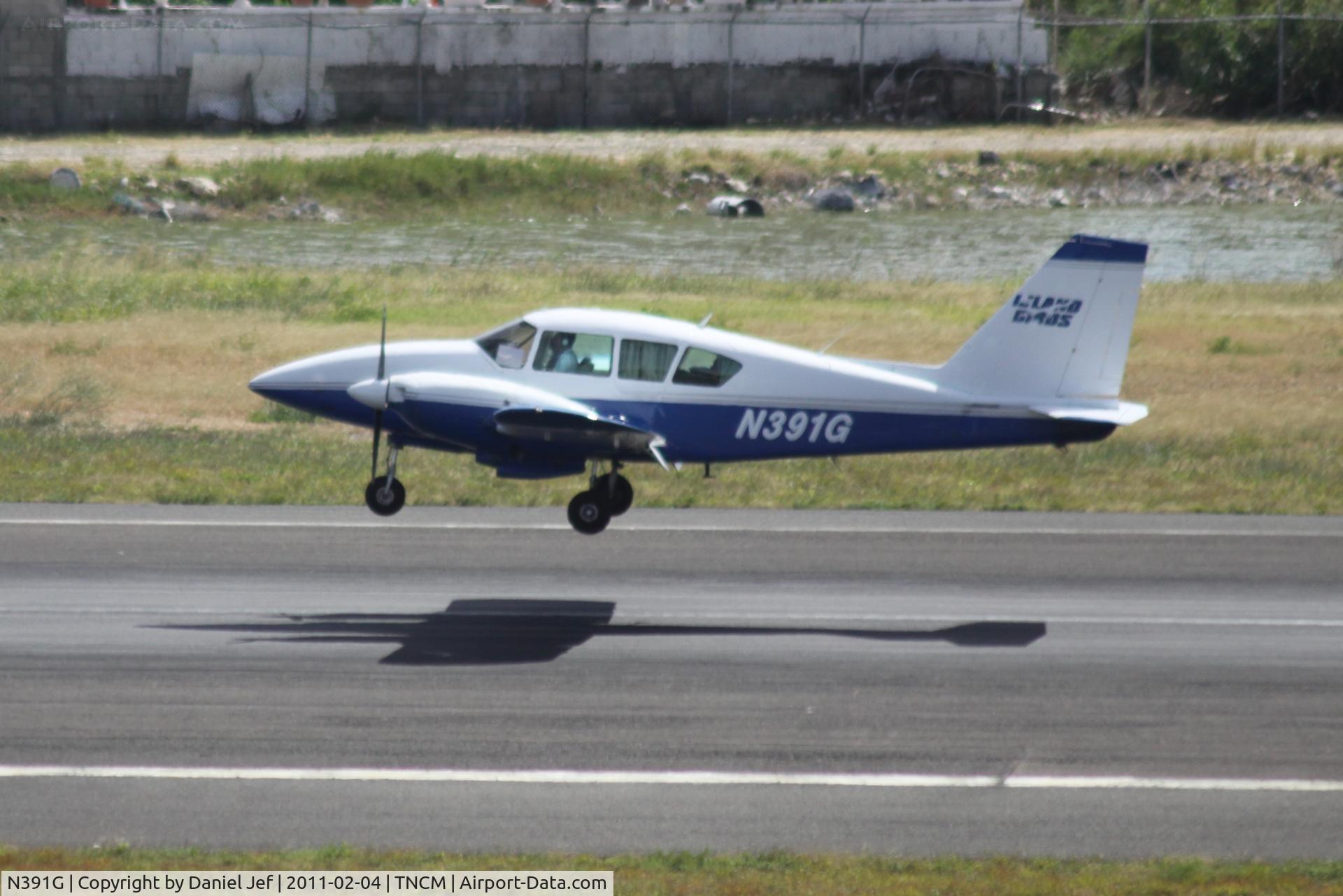 N391G, 1974 Piper PA-23-250 Aztec C/N 27-7405475, N391G landing at TNCM