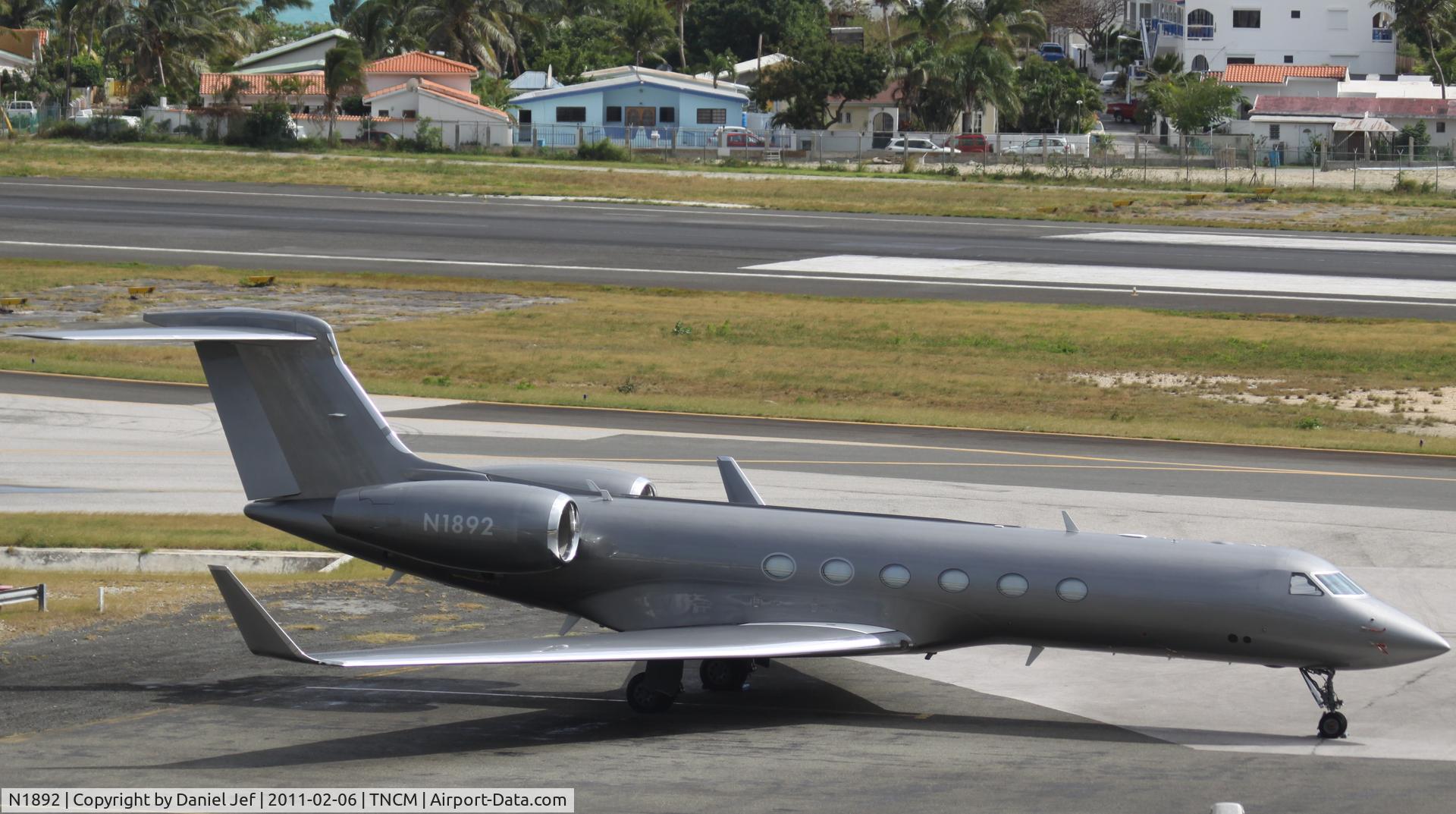 N1892, 1997 Gulfstream Aerospace G-V C/N 524, N1892 park at the cargo ramp at TNCM