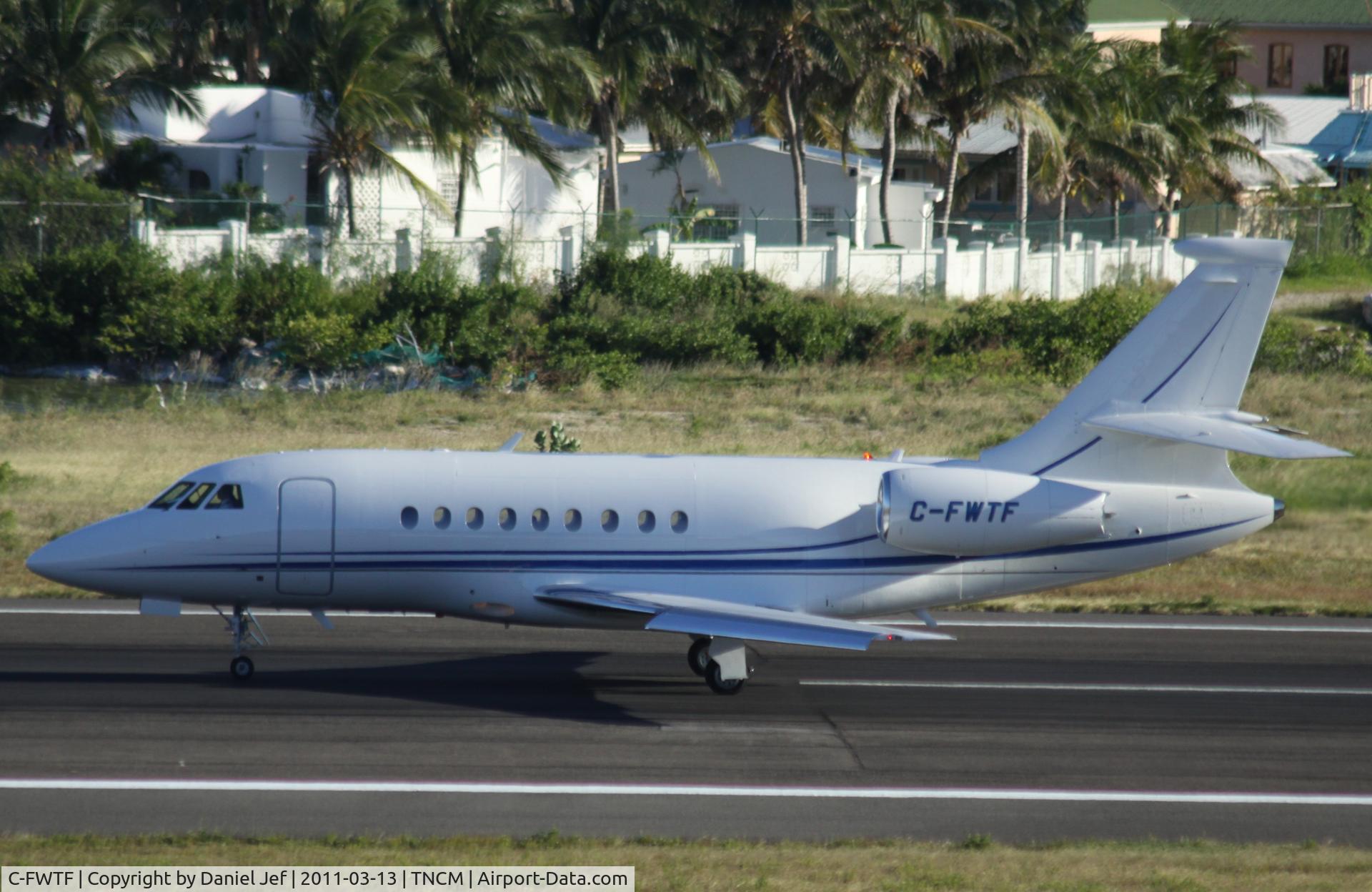 C-FWTF, 1999 Dassault Falcon 2000 C/N 71, C-FWTF departing TNCM