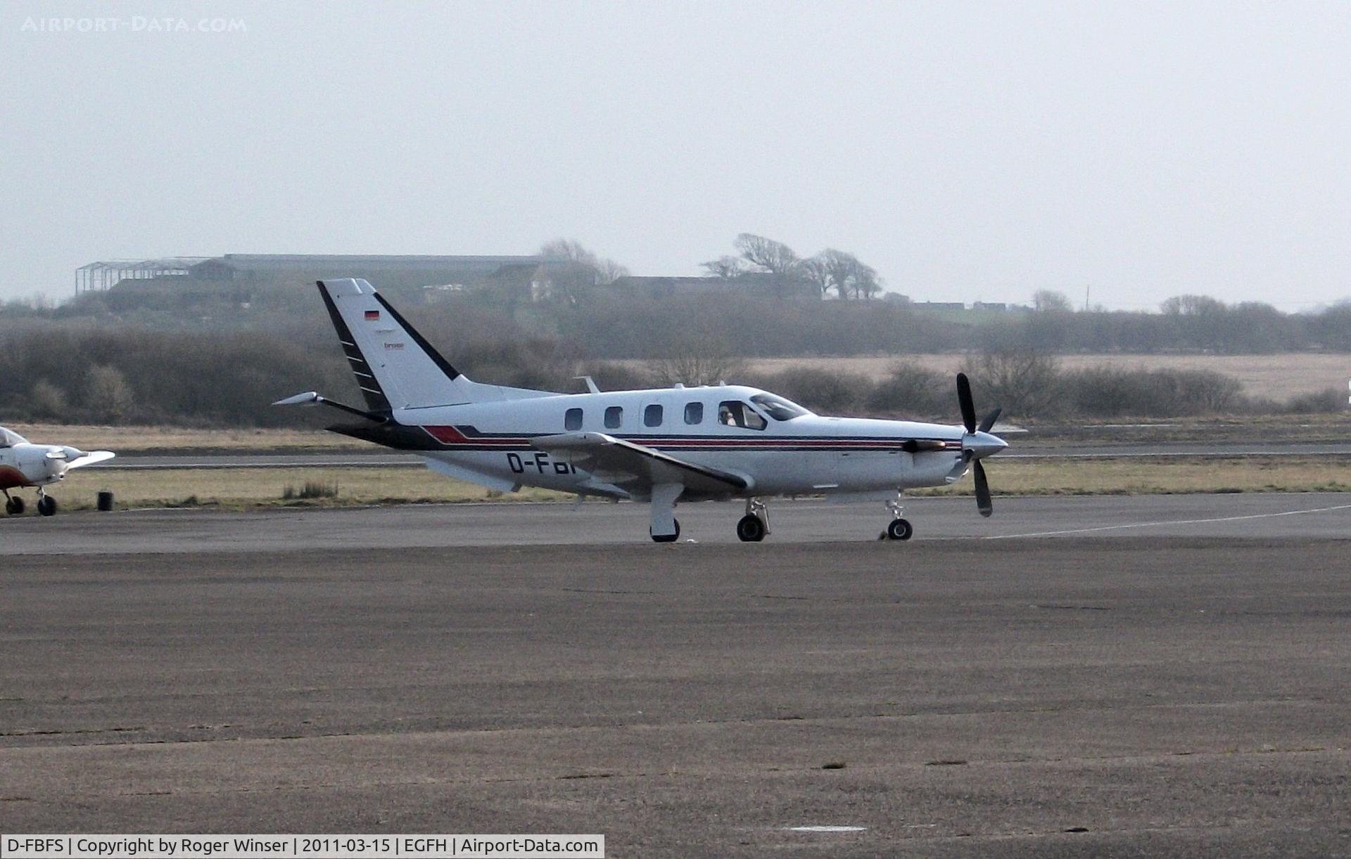 D-FBFS, 2006 Socata TBM-850 C/N 387, Visiting Swansea Airport on a misty day.