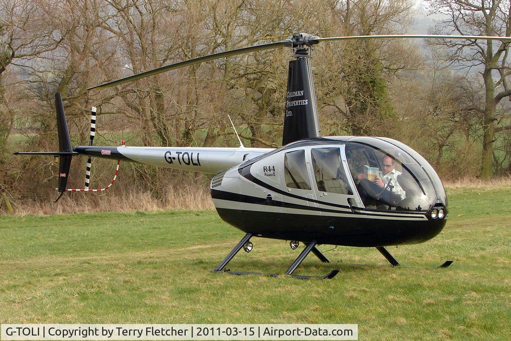 G-TOLI, 2007 Robinson R44 Raven II C/N 12009, Visitor to Day 1 of the 2011 Cheltenham Horseracing Festival