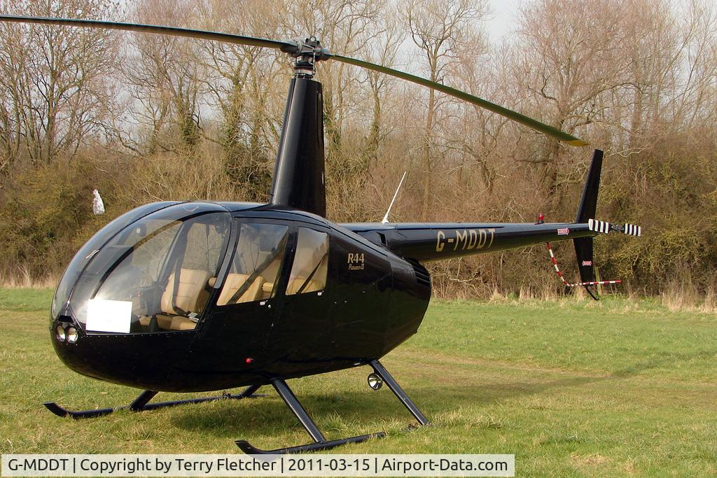 G-MDDT, 2006 Robinson R44 Raven II C/N 11474, Visitor to Day 1 of the 2011 Cheltenham Horseracing Festival