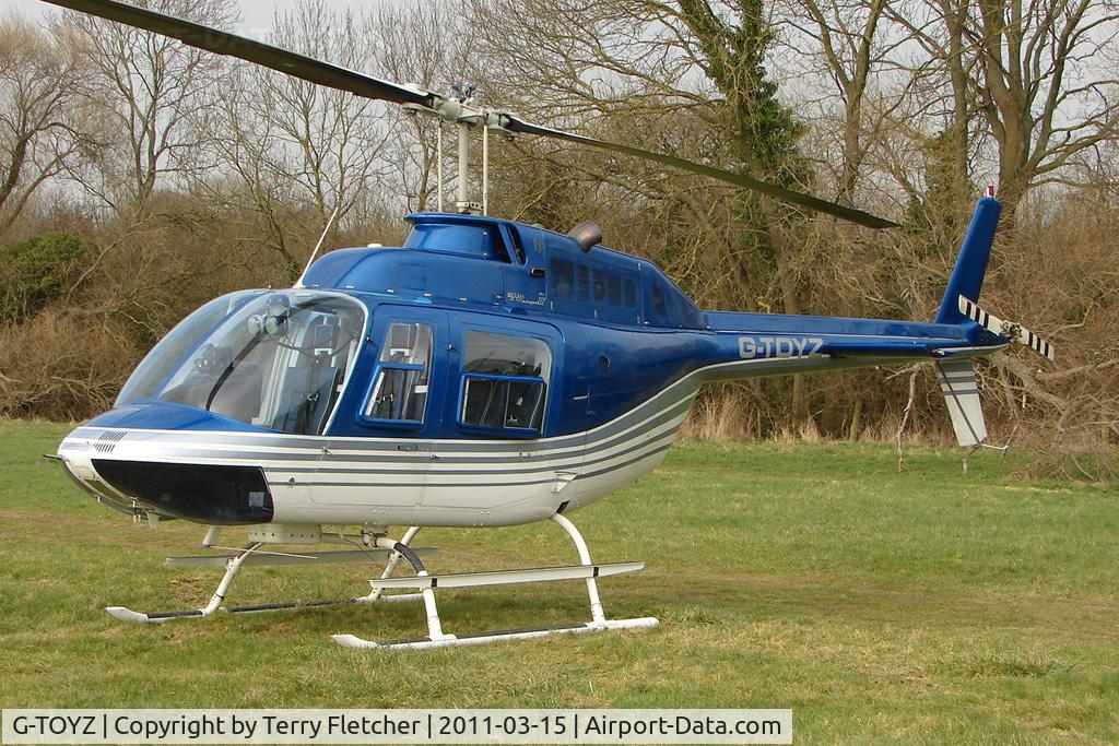 G-TOYZ, 1986 Bell 206B JetRanger III C/N 3949, Visitor to Day 1 of the 2011 Cheltenham Horseracing Festival