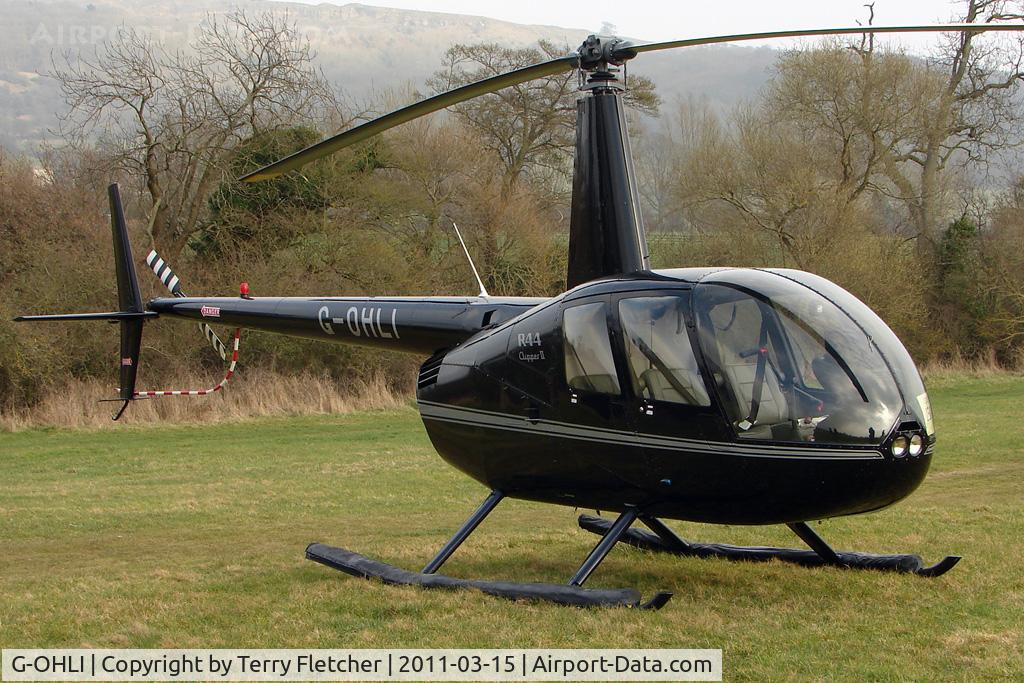 G-OHLI, 2005 Robinson R44 Clipper II C/N 10832, Visitor to Day 1 of the 2011 Cheltenham Horseracing Festival