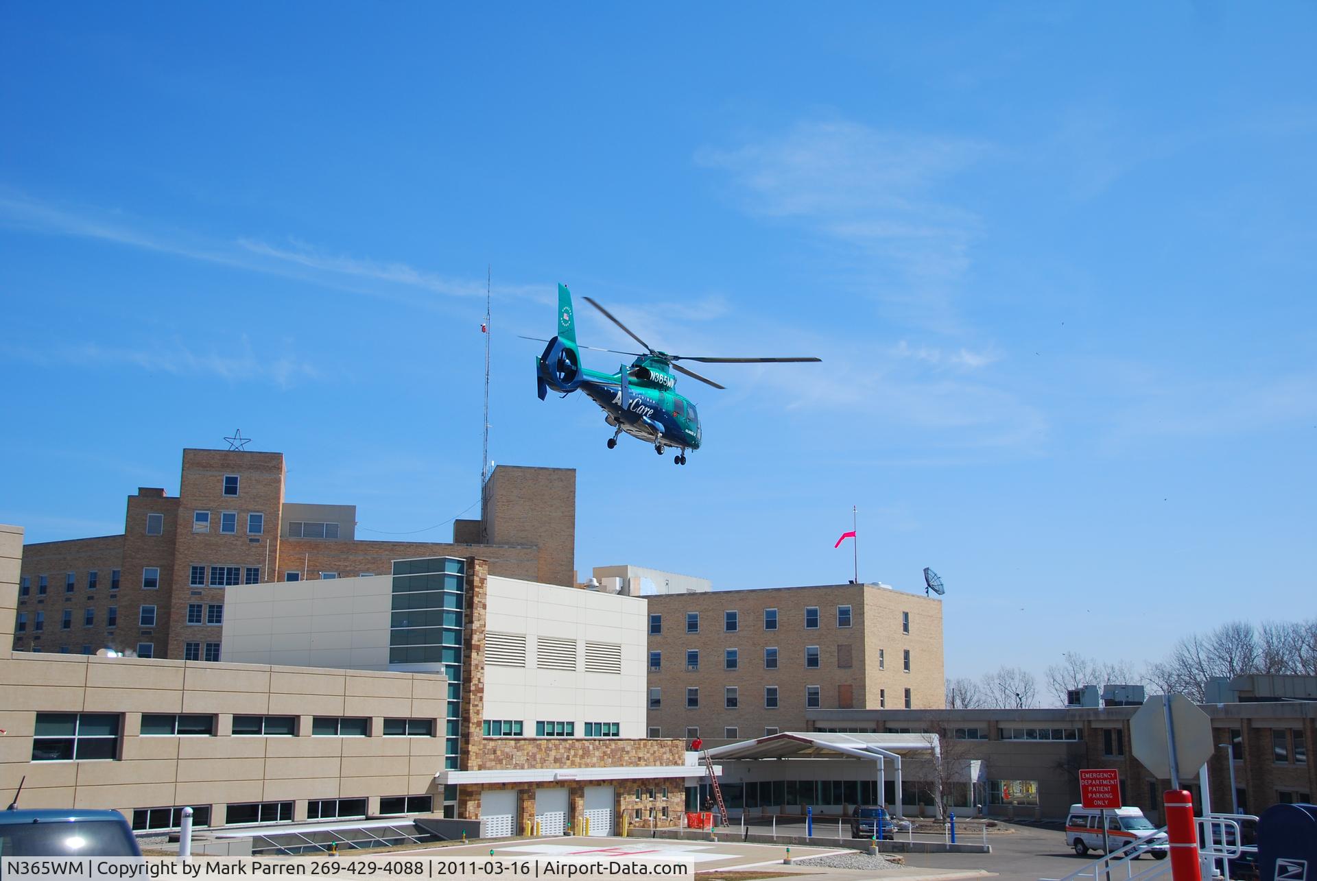 N365WM, 1991 Aerospatiale AS-365N-2 Dauphin C/N 6429, West Michigan Air Care leaving Lakeland Hospital, Saint Joseph, MI, with patient bound for Bronson Hospital Kalamazoo.