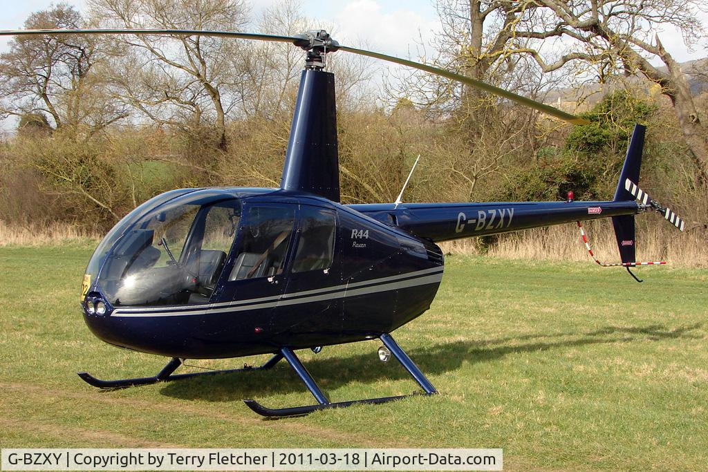 G-BZXY, 2001 Robinson R44 Raven C/N 1027, A visitor to Cheltenham Racecourse on 2011 Gold Cup Day