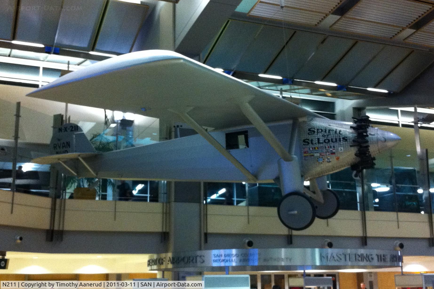N211, 1990 Ryan NYP Replica C/N 2, Ryan SPIRIT OF ST. LOUIS replica.  In Terminal 2, near baggage claim #3.