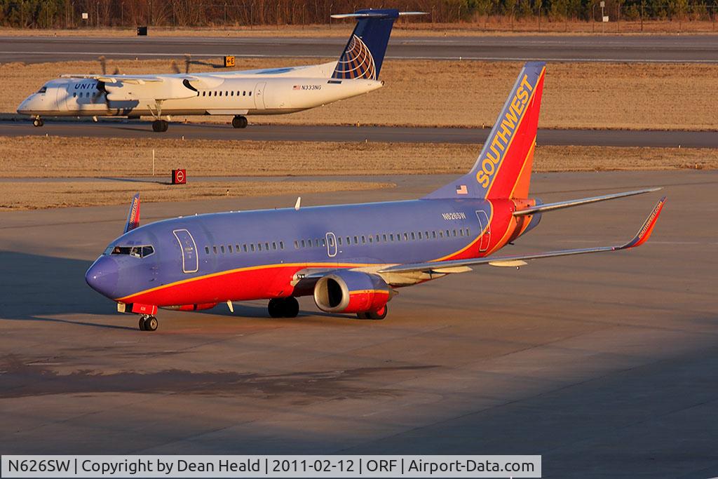 N626SW, 1996 Boeing 737-3H4 C/N 27702, Southwest Airlines N626SW (FLT SWA232) taxiing to the gate from Baltimore/Washington Int'l (KBWI) as United Express (Colgan Air) N333NG taxis to RWY 23 for departure to Newark, NJ.