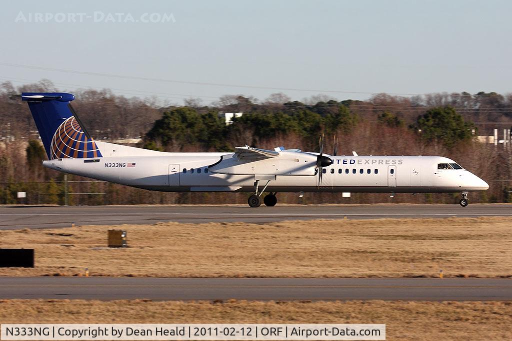 N333NG, 2010 Bombardier DHC-8-402 Dash 8 C/N 4333, United Express (Colgan Air) N333NG (FLT CJC3325) rolling out on RWY 23 after arrival from Newark Int'l (KEWR).
