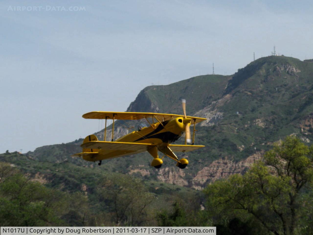 N1017U, 1939 CASA 1-131 Jungmann C/N E3B-435, 1939 Bucker JUNGMANN C.A.S.A. 1.131, Lycoming O-360 180 Hp upgrade conversion, takeoff climb Rwy 22