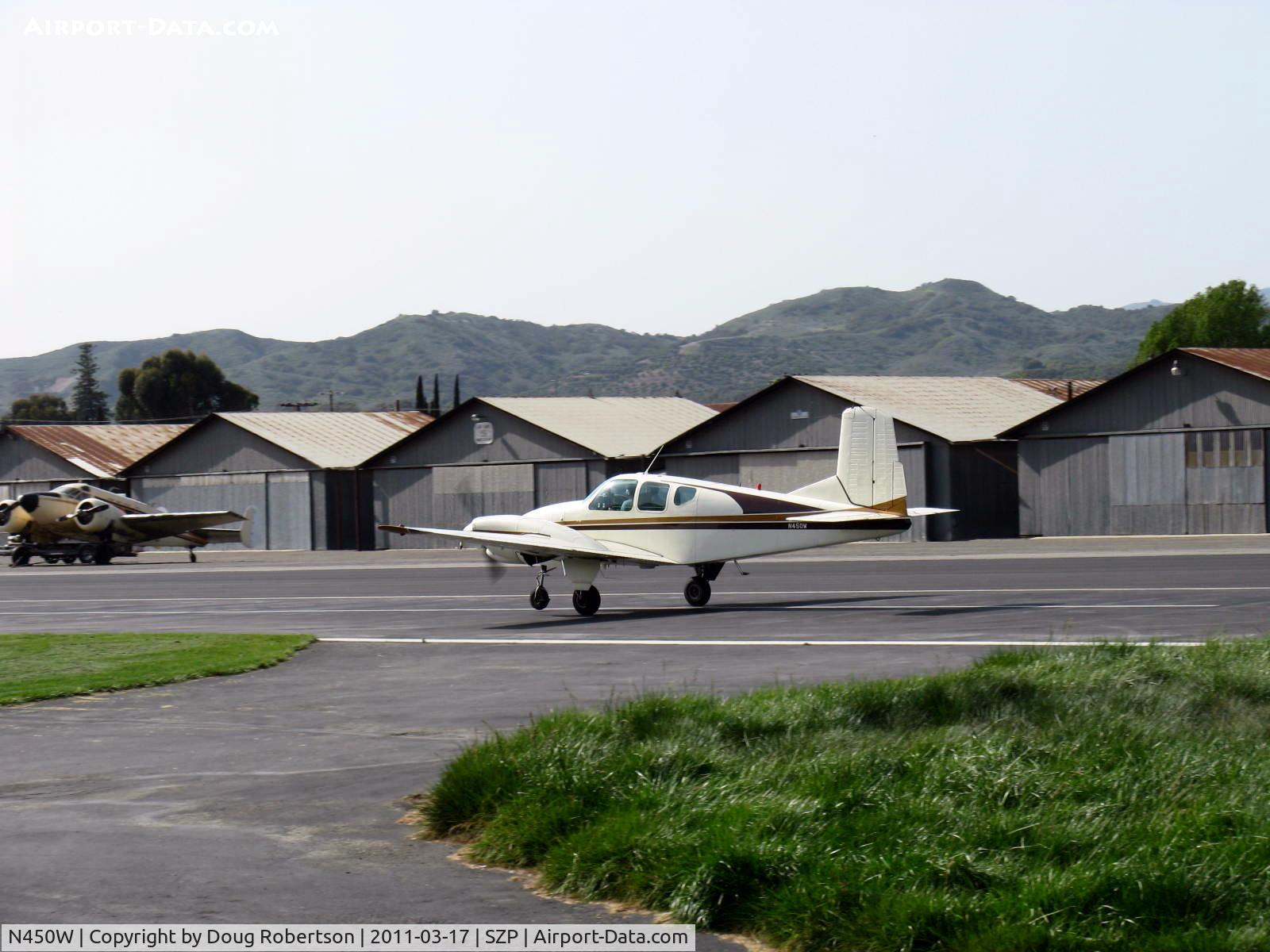 N450W, 1958 Beech 95 C/N TD-87, 1958 Beech 95 TRAVEL AIR, two Lycoming O&VO-360 180 Hp each, two-blade CS full feathering props, assist step shown retracts with gear up, takeoff roll Rwy 22