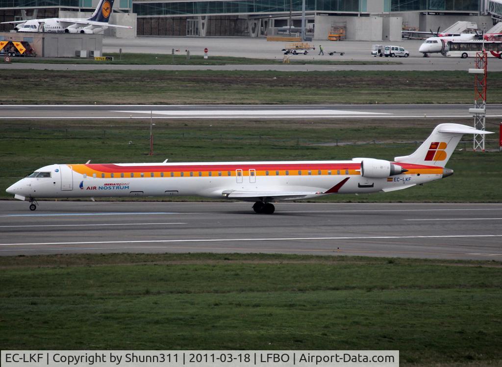 EC-LKF, 2010 Bombardier CRJ-1000ER NG (CL-600-2E25) C/N 19011, Backtracking rwy 32L to the Terminal...