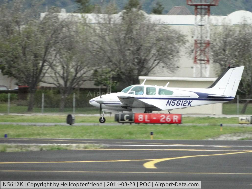 N5612K, 1964 Beech 95-B55 (T42A) Baron C/N TC-604, Rolling westbound on runway 26R heading west