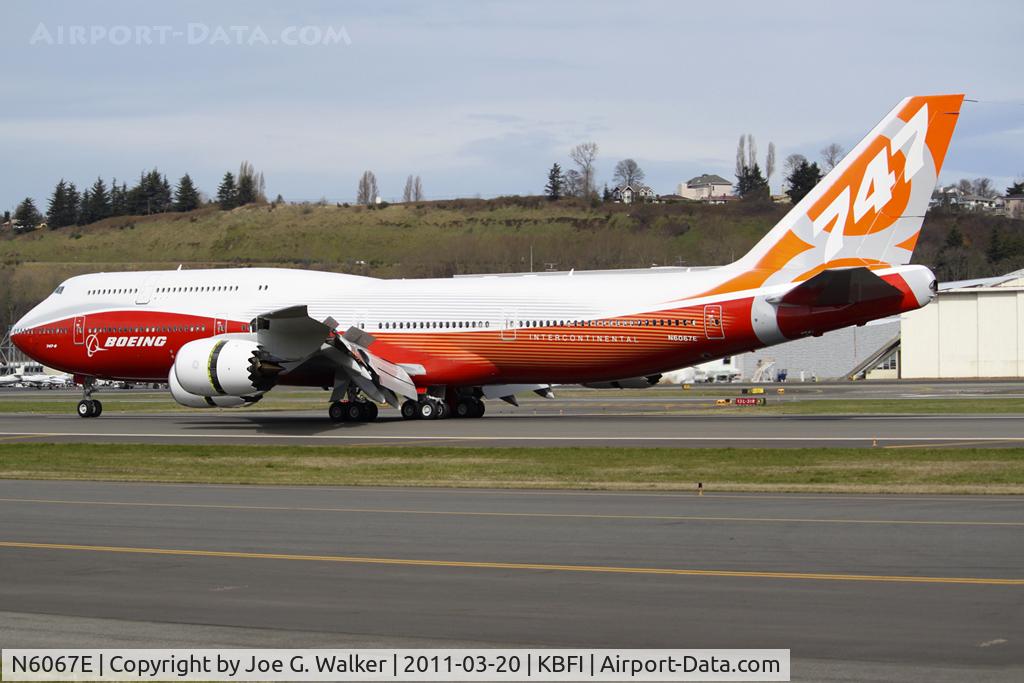 N6067E, 2011 Boeing 747-8JK BBJ C/N 38636, First 747-8I rolls out on Runway 13L after its first flight.