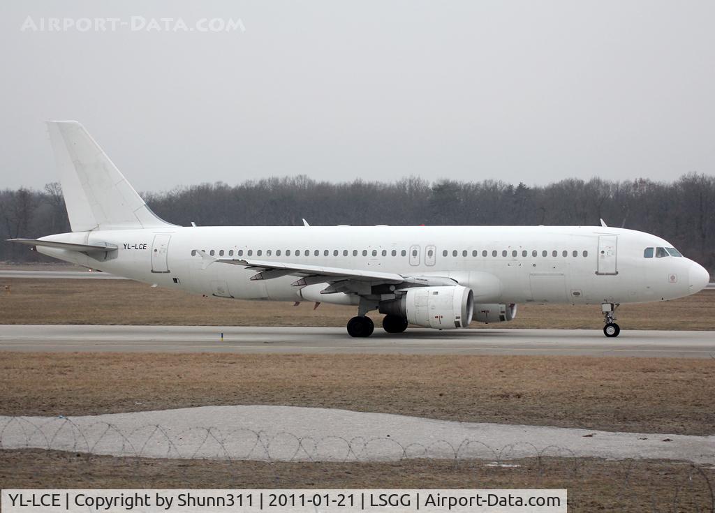 YL-LCE, 1992 Airbus A320-211 C/N 311, Taxiing holding point rwy 23 for departure... Smart Lynx flight...