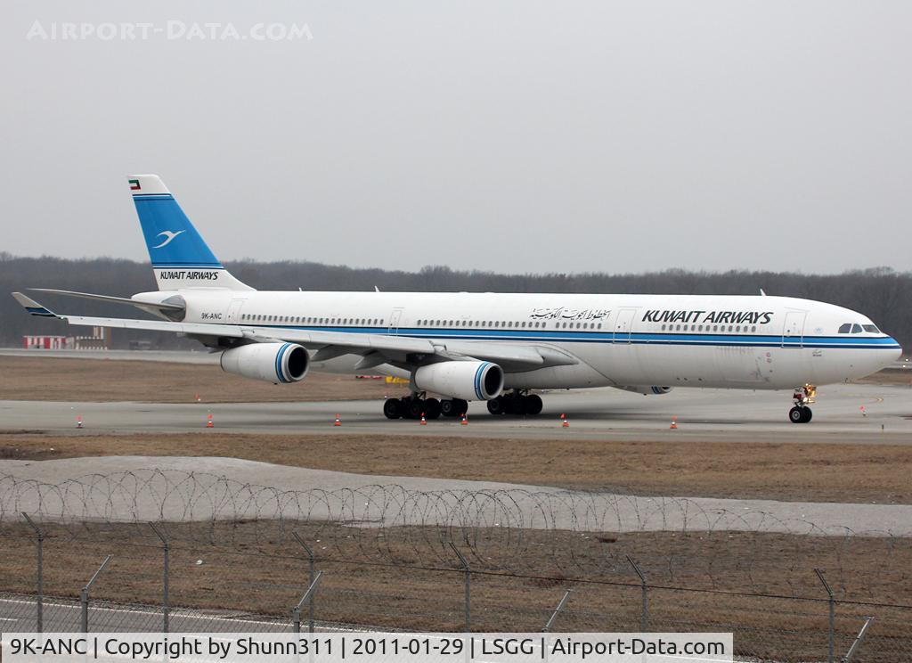 9K-ANC, 1995 Airbus A340-313 C/N 101, Taxiing holding point rwy 23 for departure...