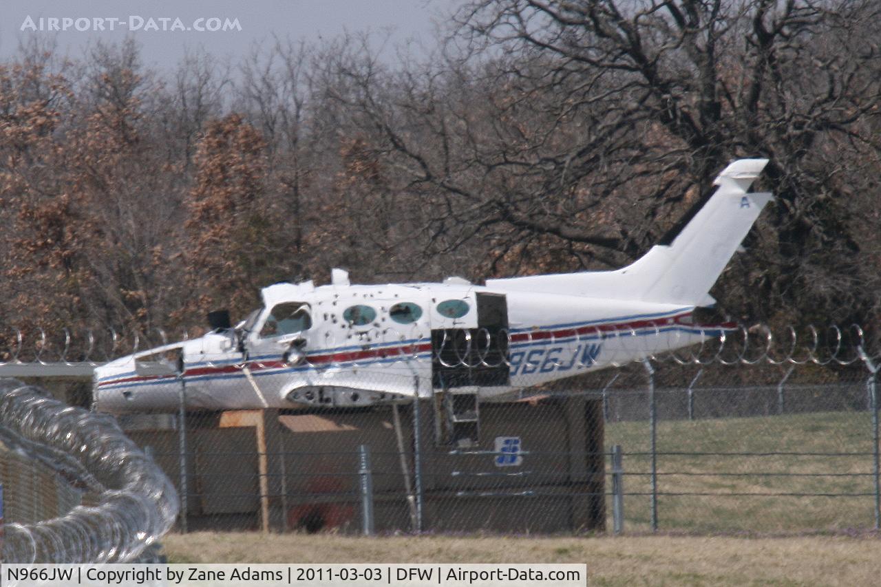 N966JW, 1967 Cessna 402 C/N 402-0066, At the police and fire training area @ DFW Airport.