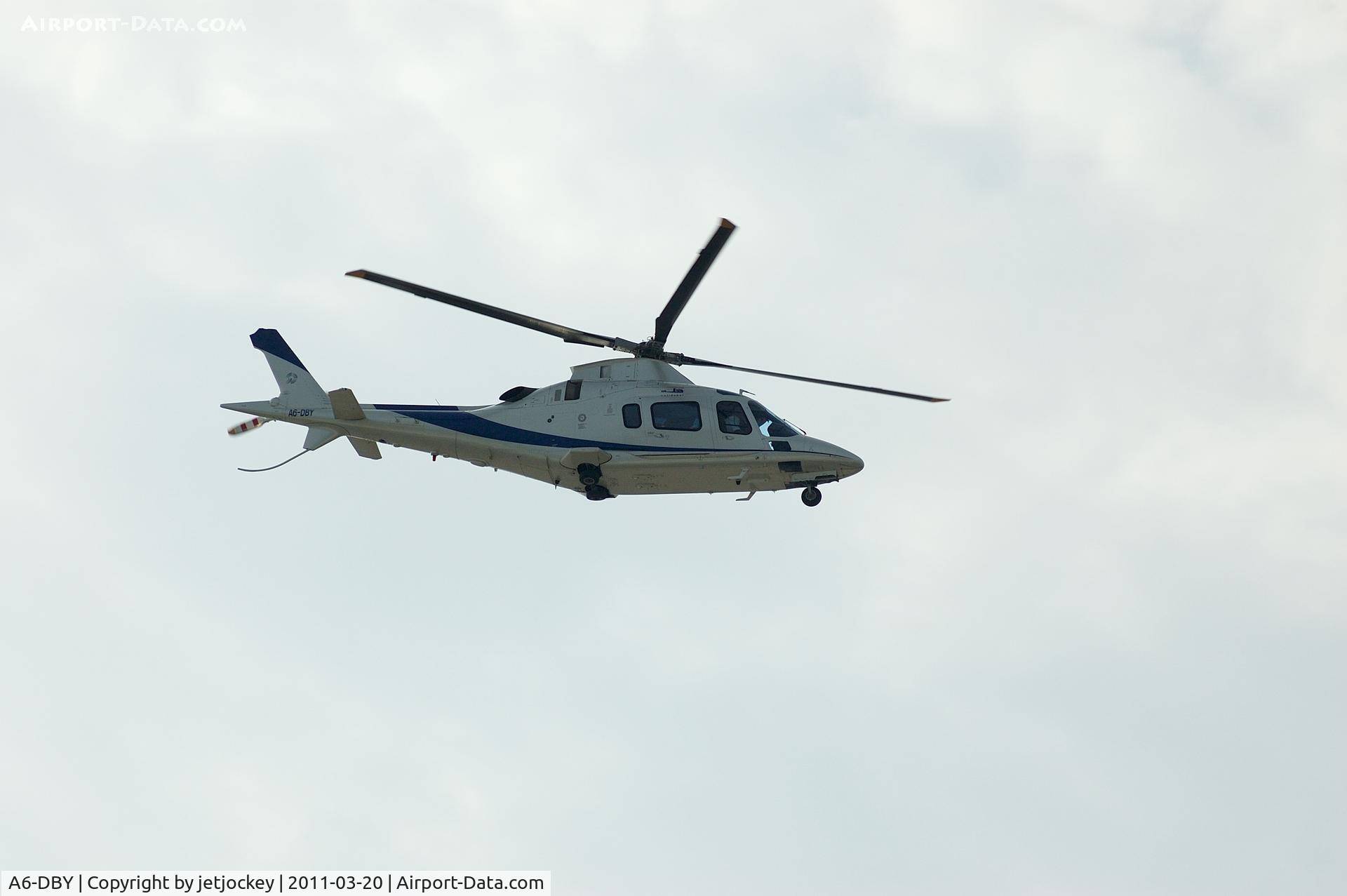 A6-DBY, Agusta A-109E Power C/N 11626, Tucking up the gear having just picked up passenger off his Yacht in Dubai