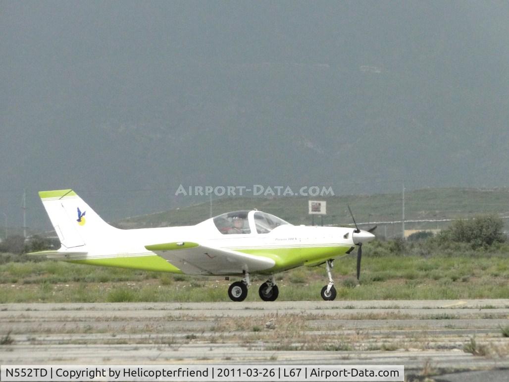 N552TD, 2003 Alpi Aviation Pioneer 300S C/N 92, Taxiing out of hanger area heading to runway 24