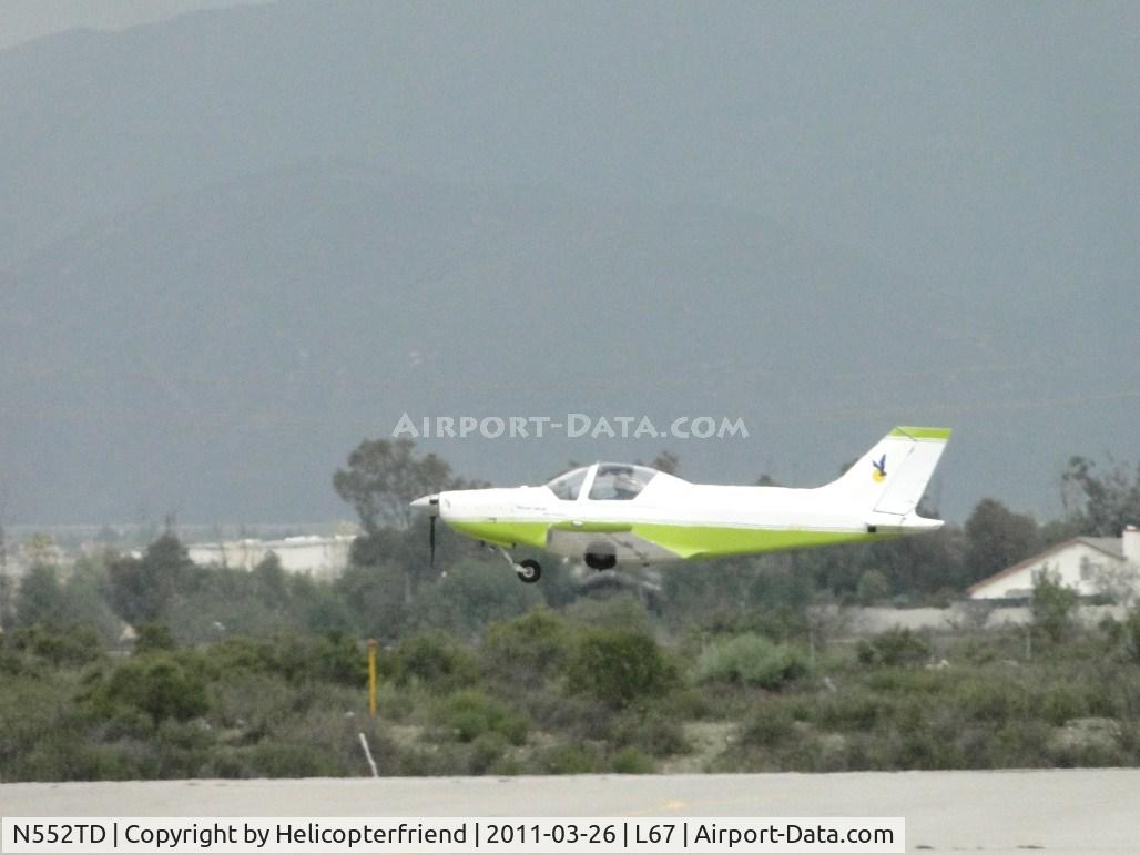 N552TD, 2003 Alpi Aviation Pioneer 300S C/N 92, Shortly after lift off, wheels are retracted while heading westbound