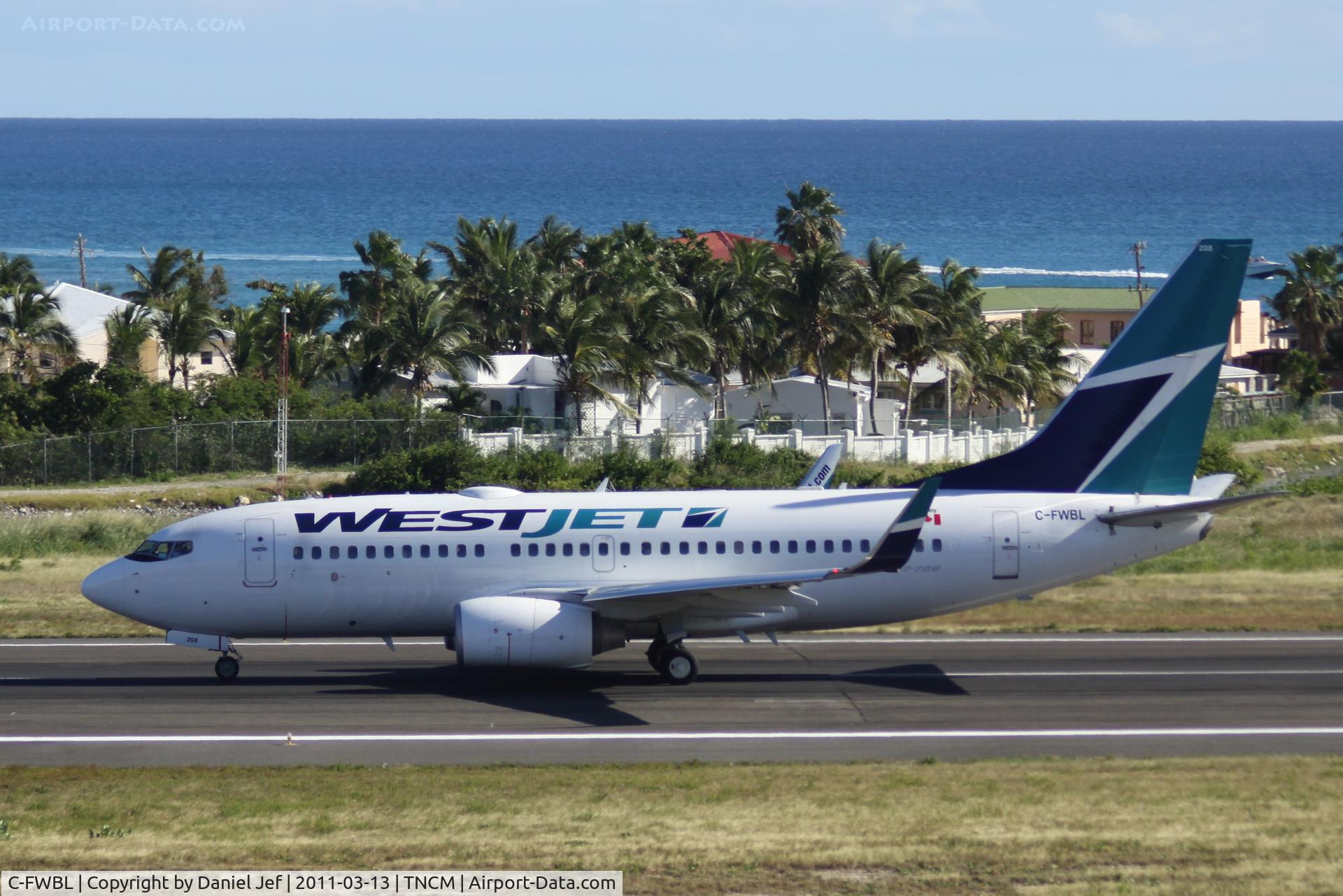 C-FWBL, 2003 Boeing 737-7CT C/N 32750, WestJet C-FWBL departing TNCM runway 10