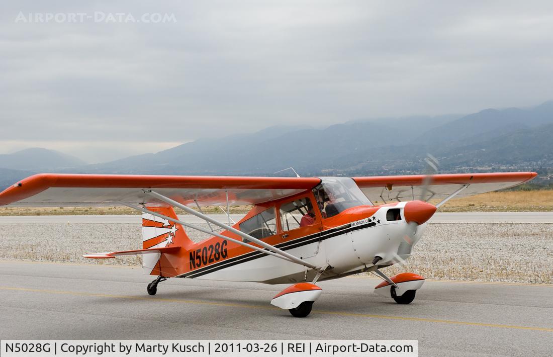 N5028G, 1979 Bellanca 8KCAB Decathlon C/N 574-79, Taxiing from Runway 26.