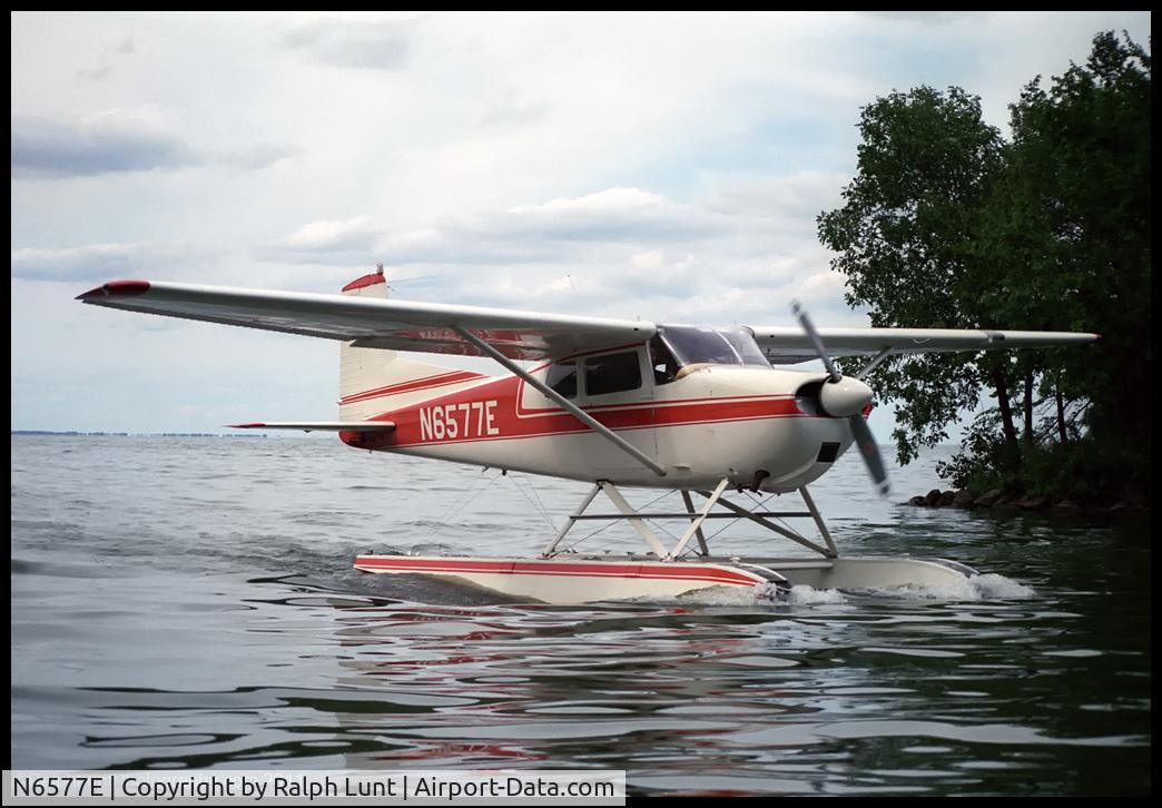 N6577E, 1959 Cessna 175 Skylark C/N 56077, Taxiing in on the Oshkosh lake - 1987.