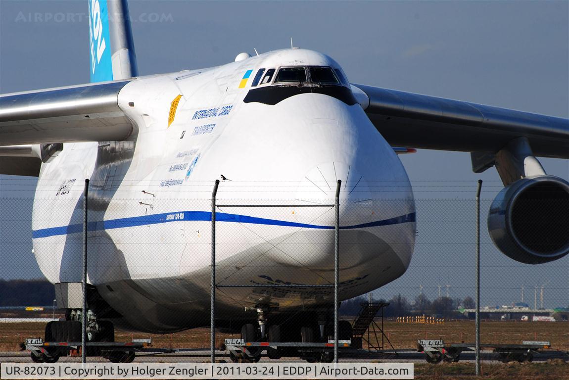 UR-82073, 1994 Antonov An-124-100 Ruslan C/N 9773054359139, That little bird on the fence dreams to become such a big bird one day..........