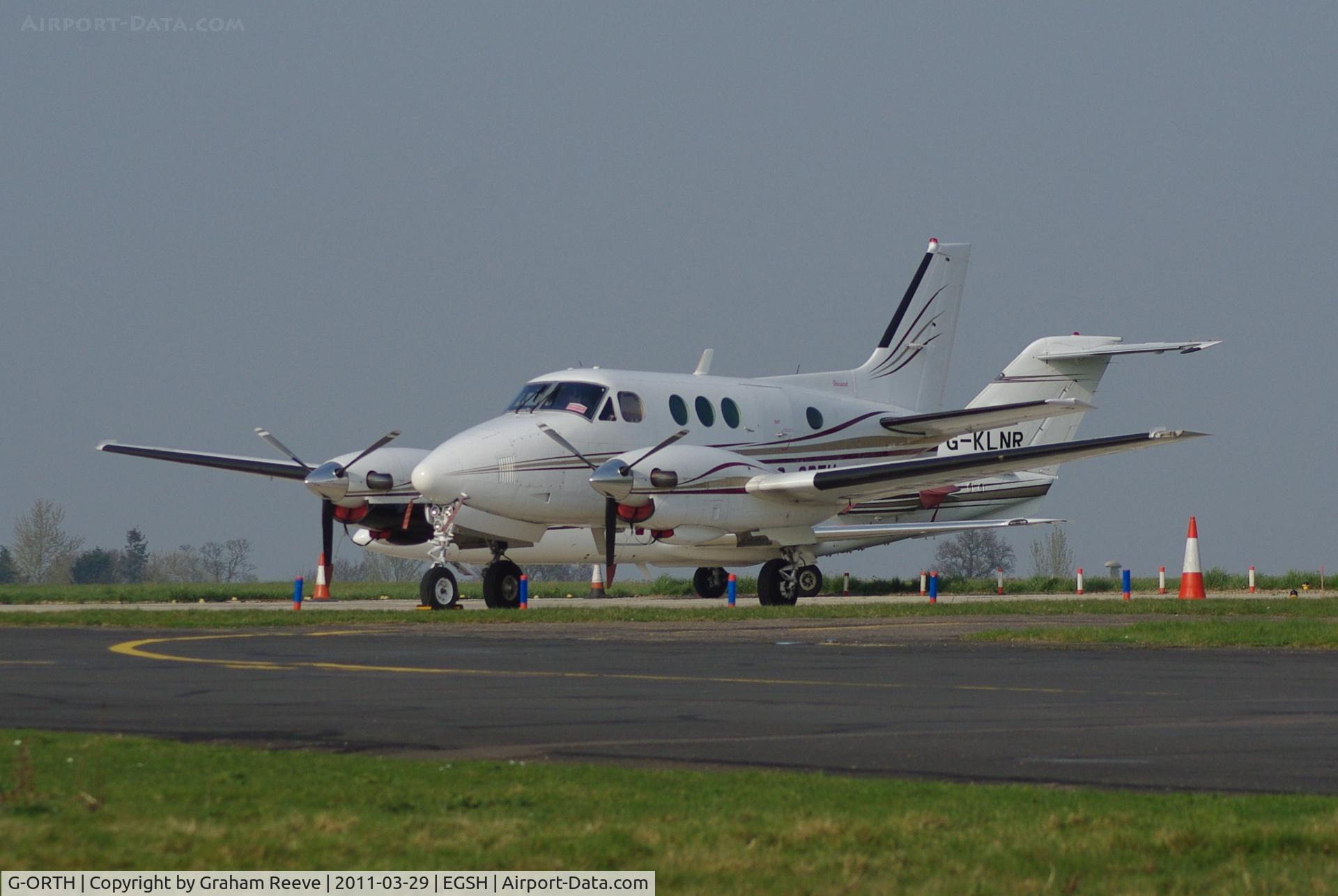 G-ORTH, 1975 Beech E90 King Air C/N LW-136, Parked at Norwich.