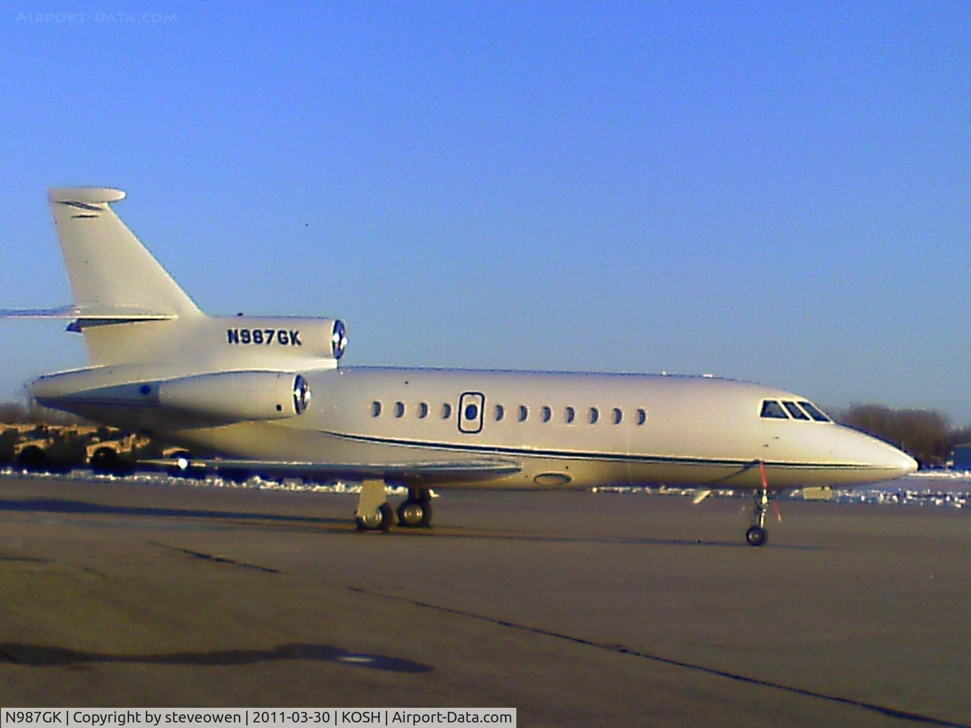 N987GK, 1990 Dassault Falcon 900 C/N 88, Caught in the setting Sun 30MAR2011 Orion Ramp KOSH