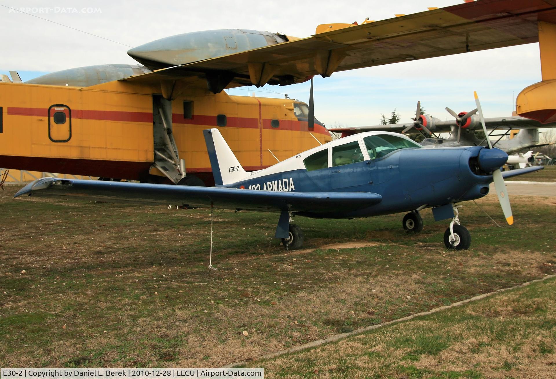 E30-2, 1964 Piper PA-24-260 Comanche C/N 24-4075, It appears that a Canadair CL-215 has taken this former Spanish Navy Piper Commance under its wing.