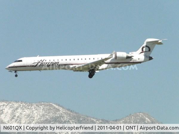 N601QX, 2000 Bombardier CRJ-701 (CL-600-2C10) Regional Jet C/N 10009, On final to runway 26R arriving from Portland, Oregon