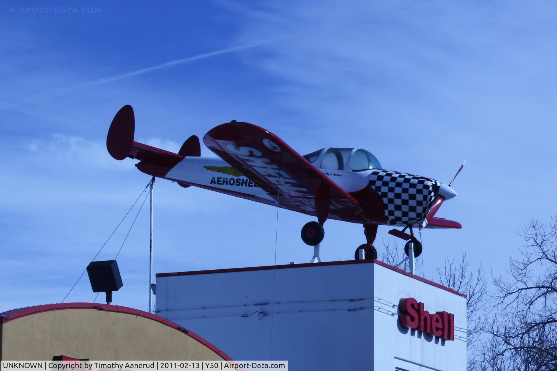UNKNOWN, Miscellaneous Various C/N unknown, Ercoupe on the top of the Shell gas station in Wautoma, WI. Station is on Highway 21.