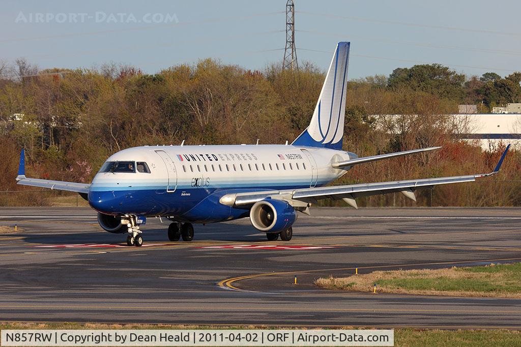 N857RW, 2005 Embraer 170SE (ERJ-170-100SE) C/N 17000079, United Express (Shuttle America) N857RW (FLT TCF7619) exiting RWY 5 at Taxiway Echo after arrival from Washington Dulles Int'l (KIAD).