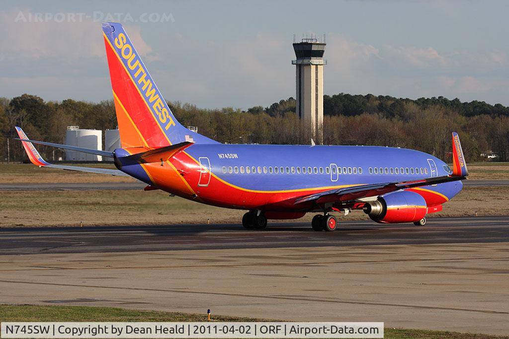 N745SW, 1999 Boeing 737-7H4 C/N 29491, Southwest Airlines N745SW (FLT SWA3027) taxiing to RWY 5 for departure to Las Vegas McCarran Int'l (KLAS).