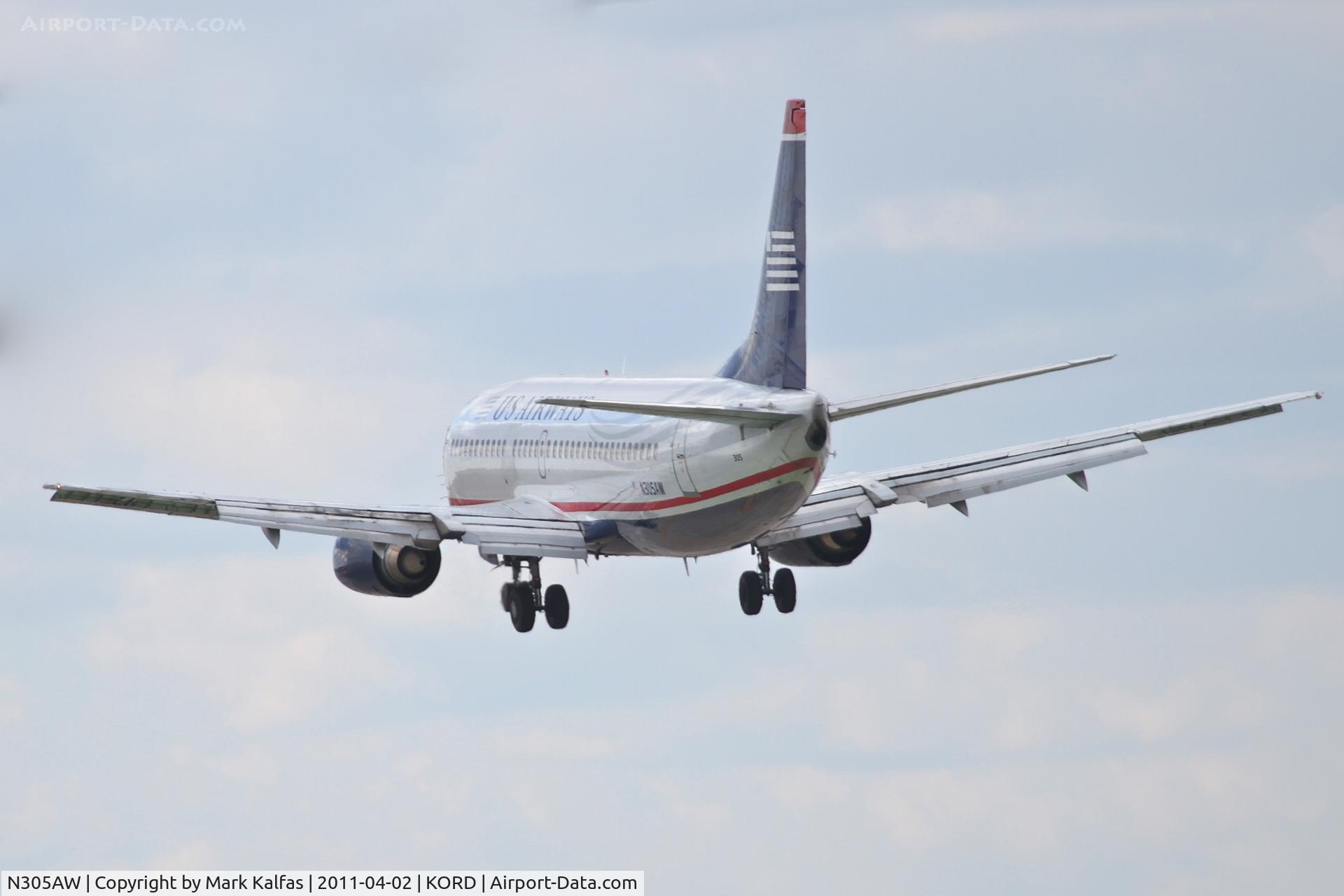 N305AW, 1988 Boeing 737-3G7 C/N 24012, US AIRWAYS Boeing 737-3G7, AWE3 arriving from KPHX, on final RWY 28 KORD.