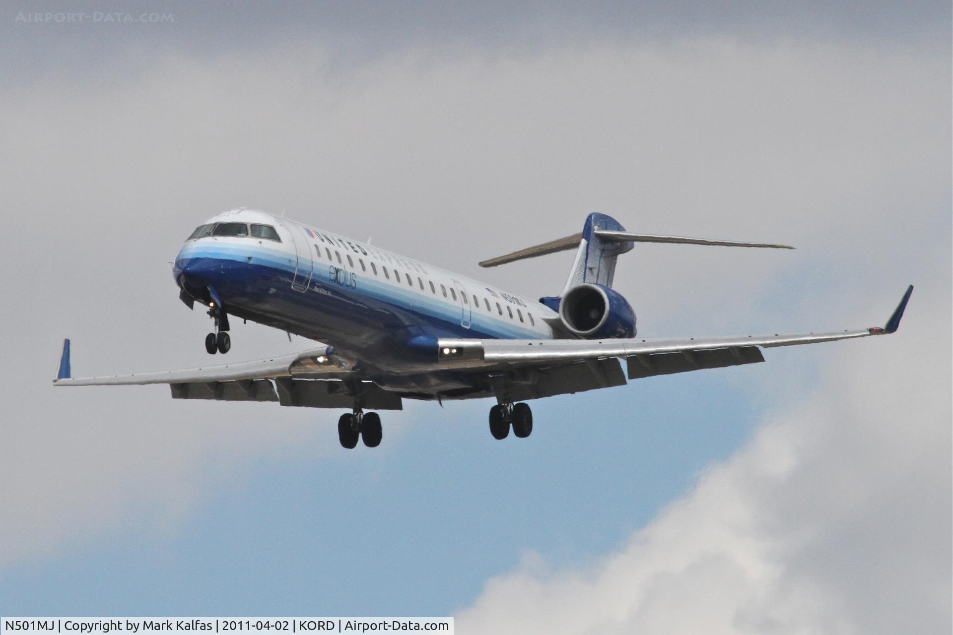 N501MJ, 2002 Canadair CL-600-2C10 Regional Jet CRJ-700 C/N 10047, Mesa Airlines/United Express Bombardier CL-600-2C10, ASH7256 arriving from KDFW, on approach RWY 28 KORD.