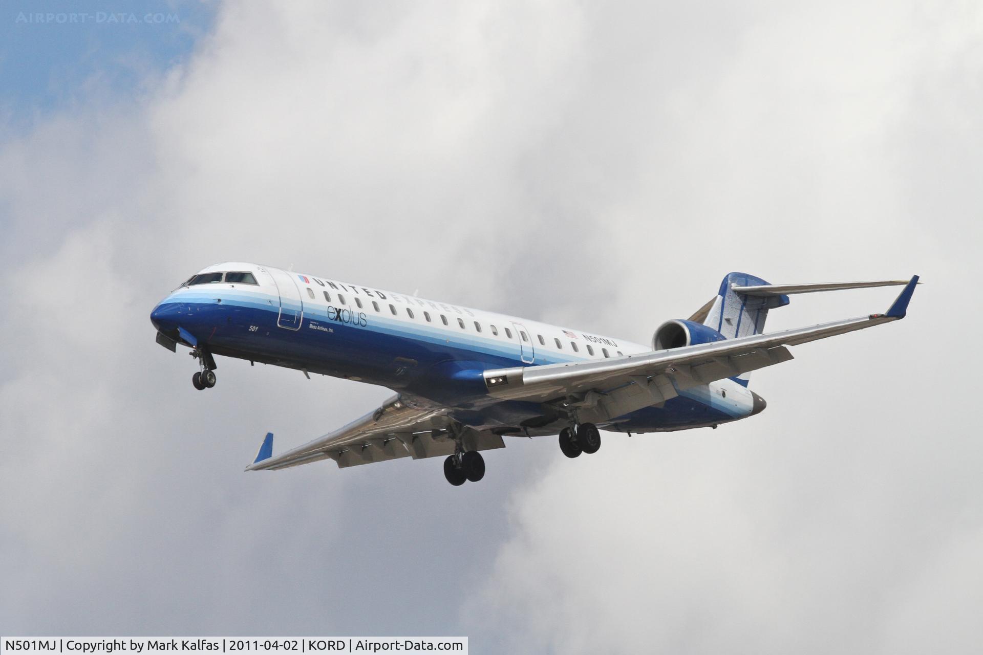 N501MJ, 2002 Canadair CL-600-2C10 Regional Jet CRJ-700 C/N 10047, Mesa Airlines/United Express Bombardier CL-600-2C10, ASH7256 arriving from KDFW, on approach RWY 28 KORD.