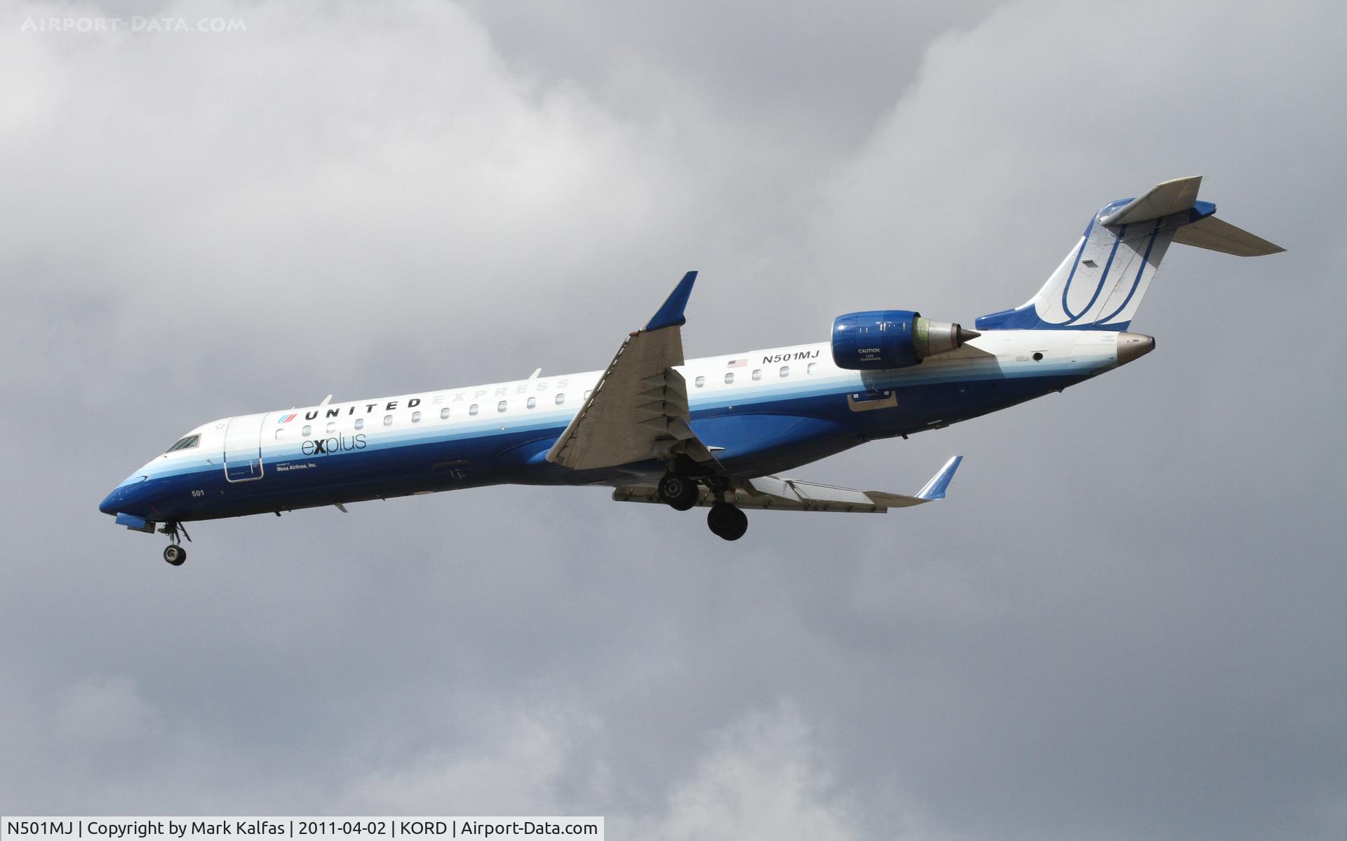 N501MJ, 2002 Canadair CL-600-2C10 Regional Jet CRJ-700 C/N 10047, Mesa Airlines/United Express Bombardier CL-600-2C10, ASH7256 arriving from KDFW, on approach RWY 28 KORD.