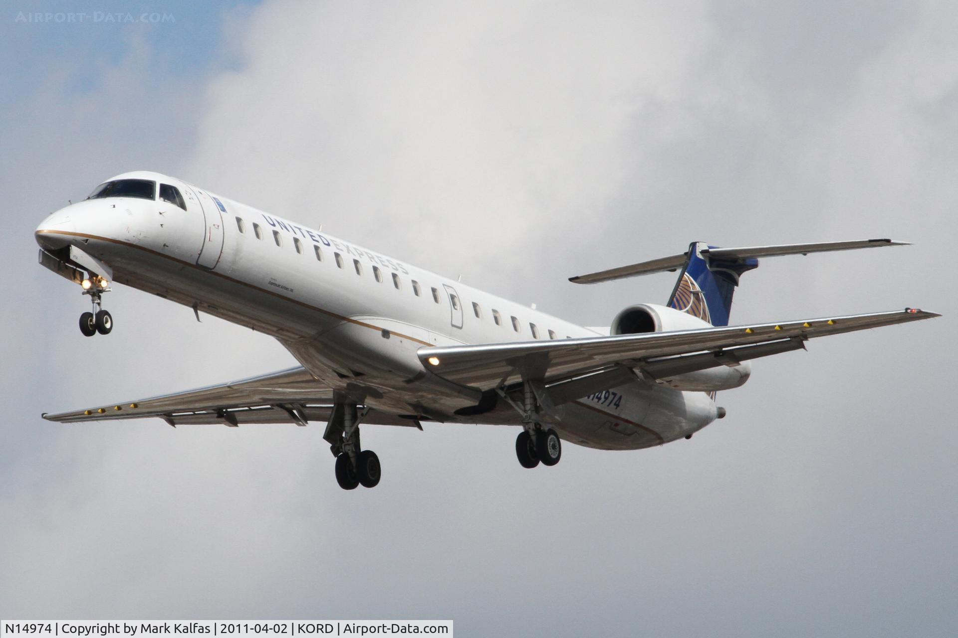 N14974, 1999 Embraer ERJ-145LR (EMB-145LR) C/N 145161, ExpressJet/United Express Embraer EMB-145LR, BTA6047 arriving from KDSM, on approach RWY 28 KORD.